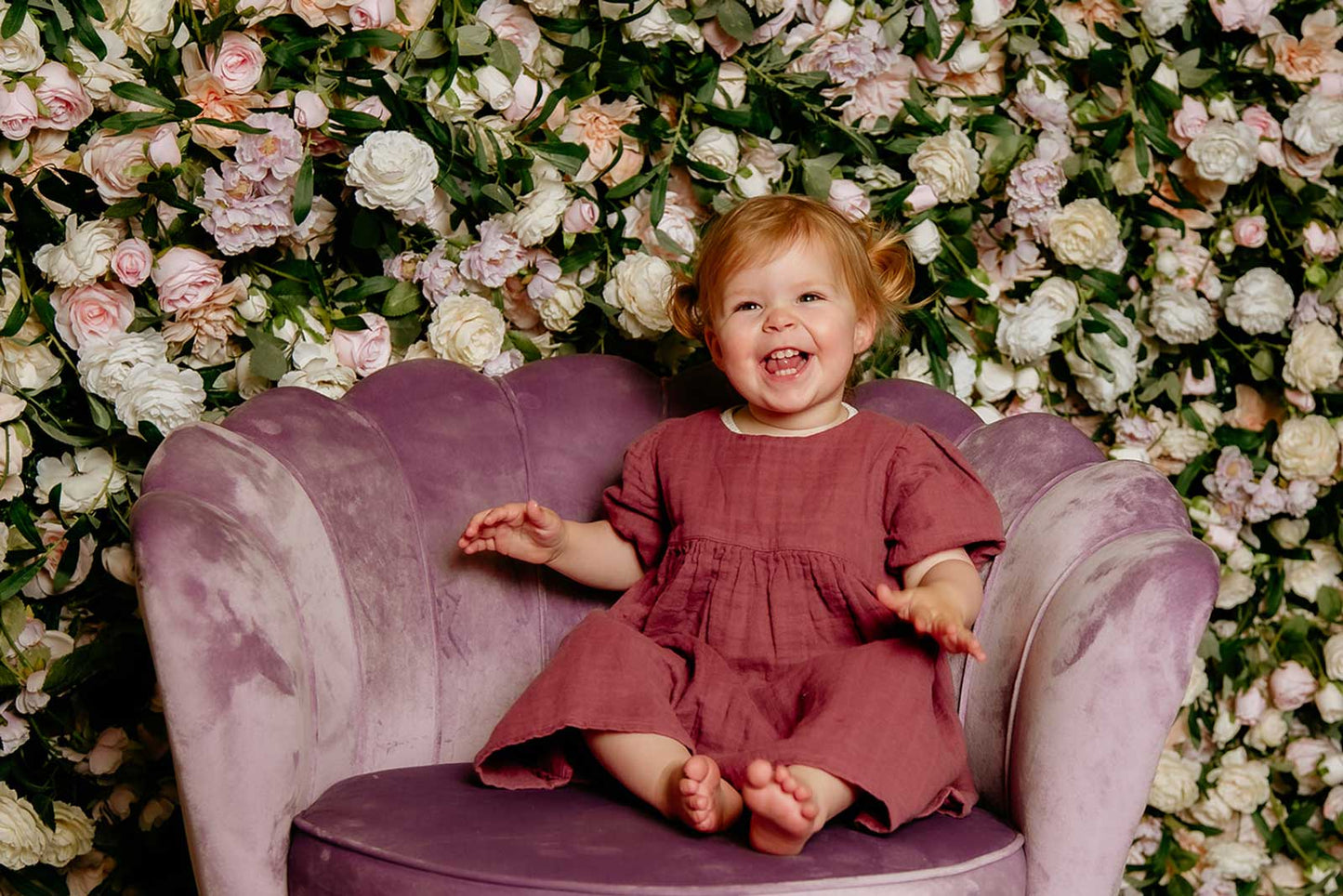 Bright and fun flower wall backdrop for children’s birthday party photos