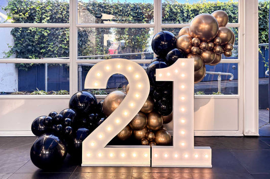 Light up numbers with balloon display for 21st birthday event in Auckland