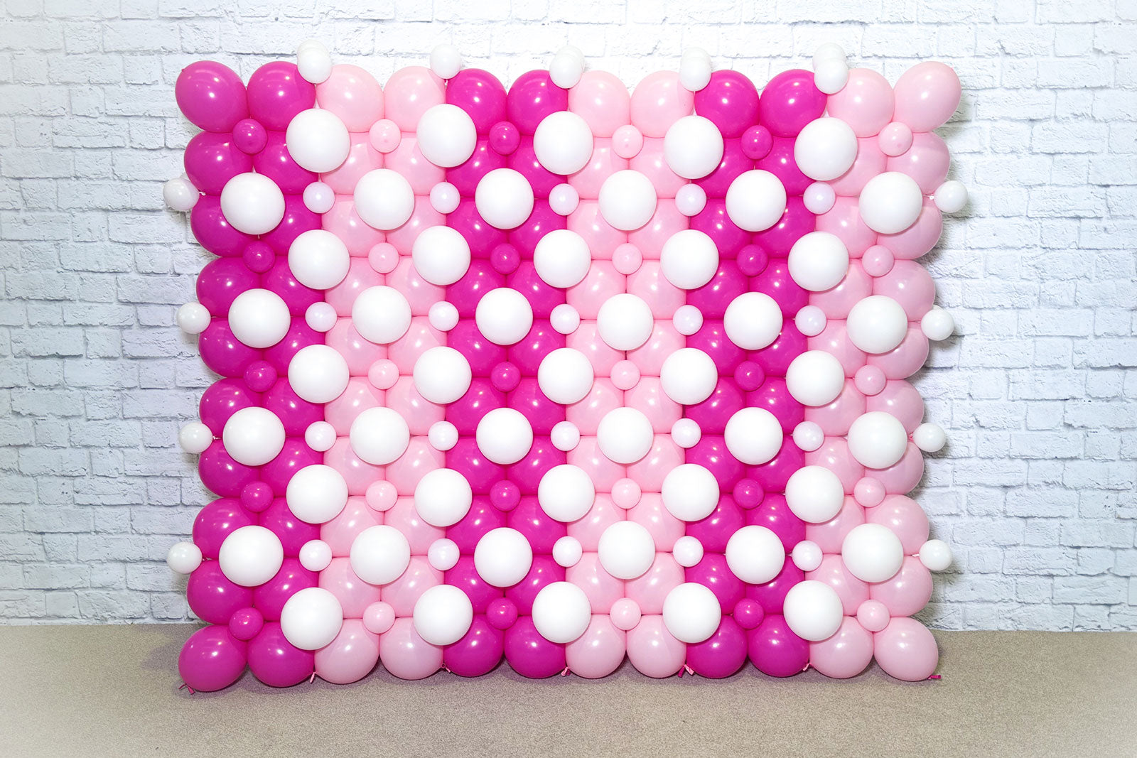 Link-O-Loon balloon wall for hire, creating a fun and interactive photo backdrop for parties and events