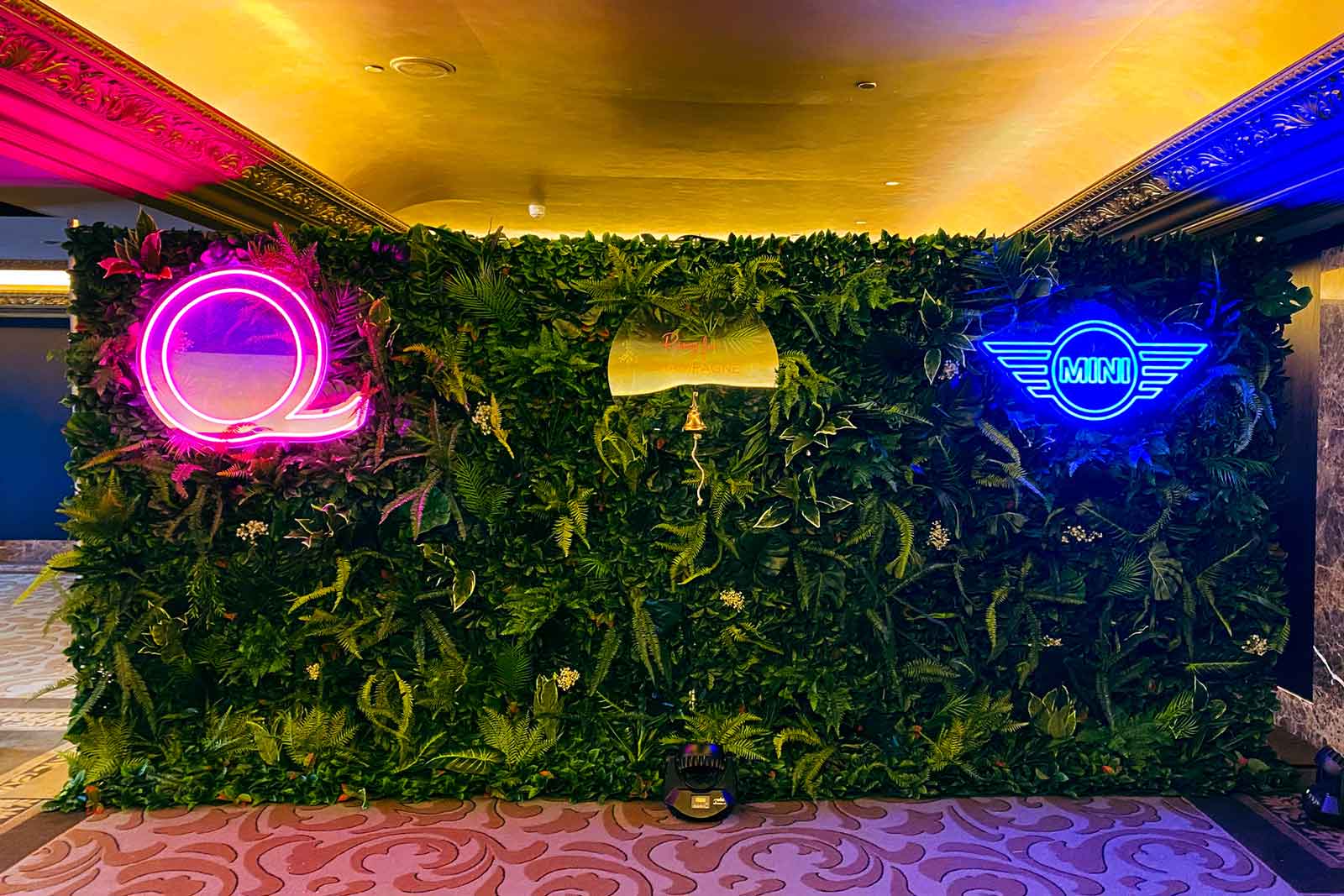 Lush green tropical wall backdrop for weddings, birthdays and corporate event styling in New Zealand