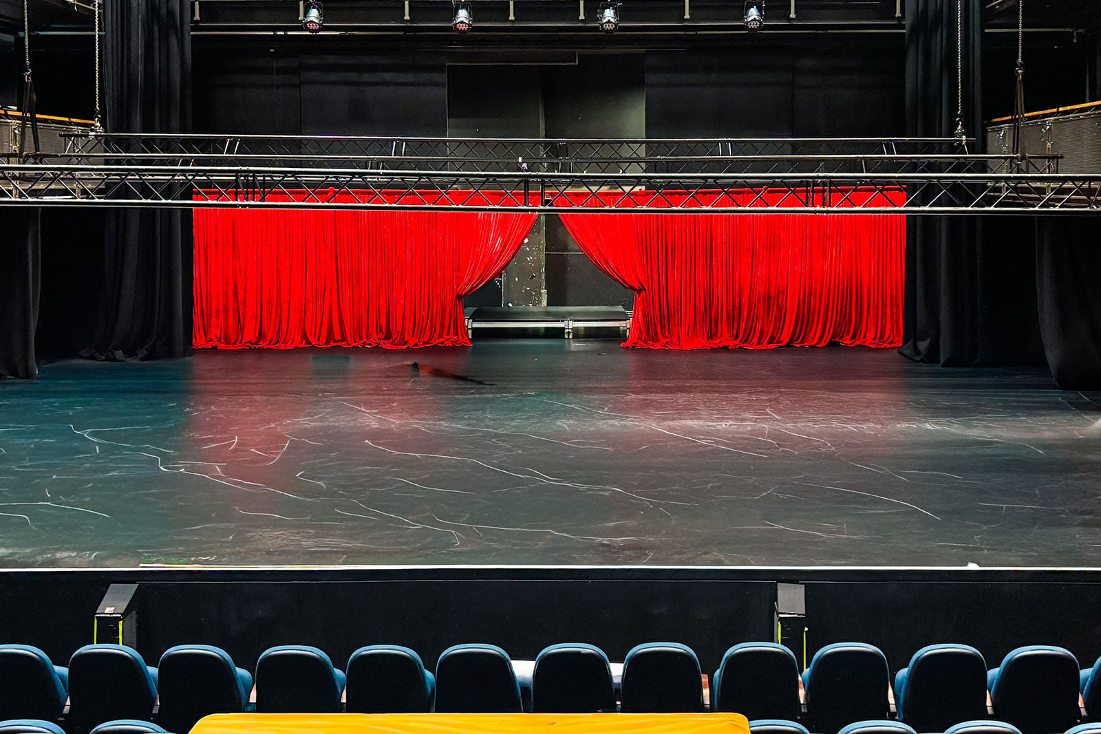 Luxurious red velvet draping for hire to style parties, corporate events, and celebrations