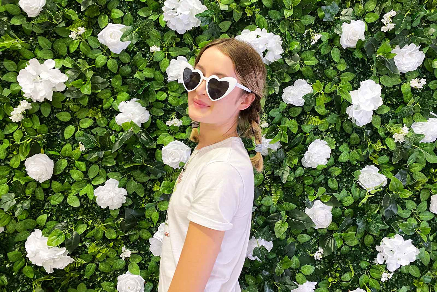 Luxury floral party backdrop hire with realistic blooms for elegant celebrations