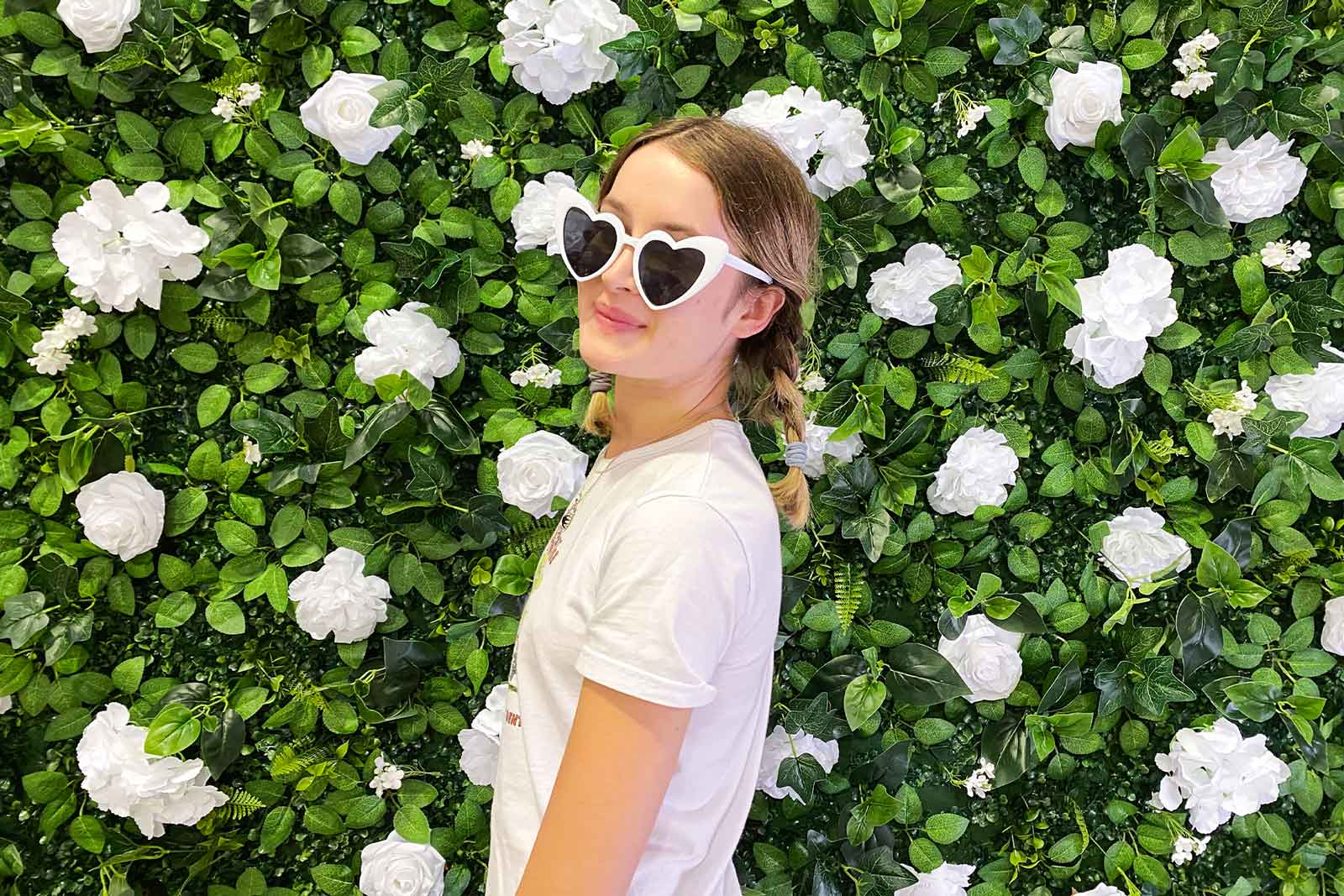 Luxury floral party backdrop hire with realistic blooms for elegant celebrations