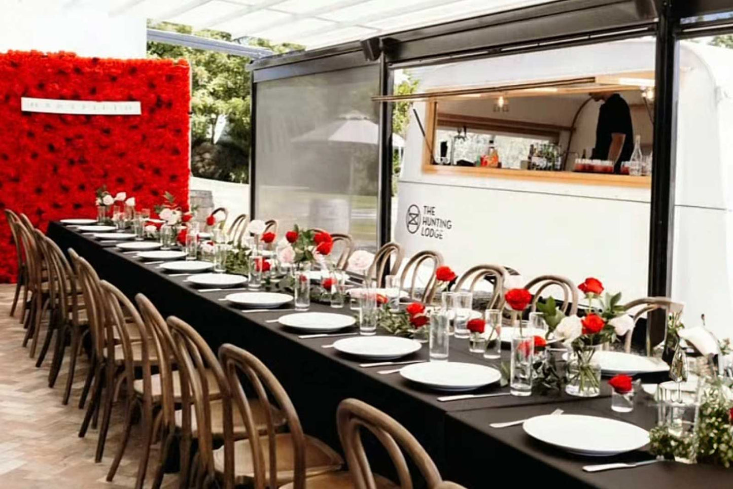 Luxury red flower wall backdrop for corporate gala dinners and awards nights in Auckland