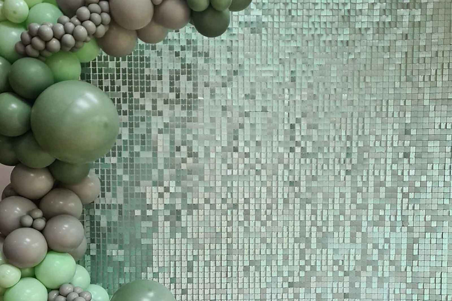 Mint green shimmer wall hire for birthdays, baby showers, and stylish themed events