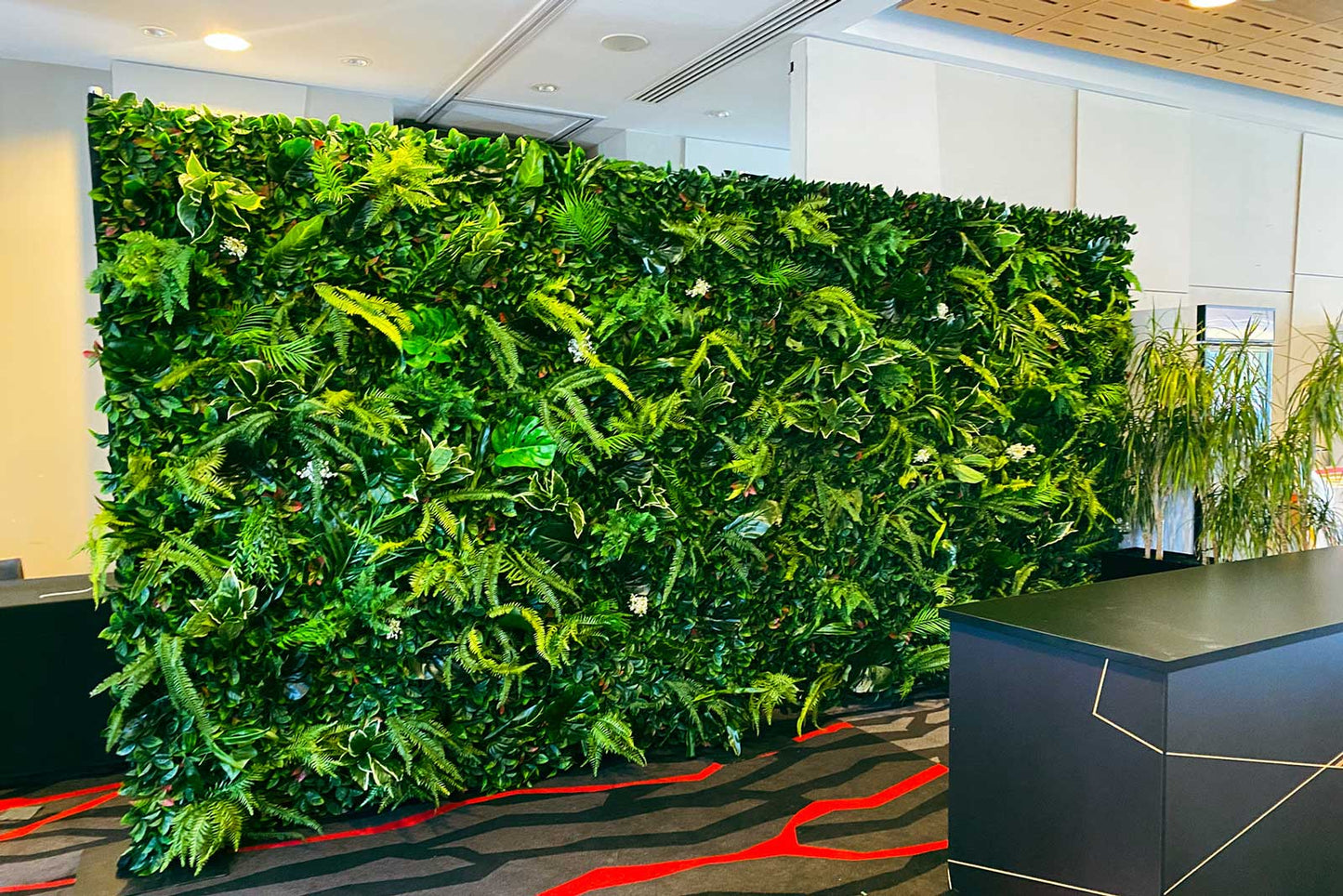 Modern tropical wall backdrop for corporate branding and events