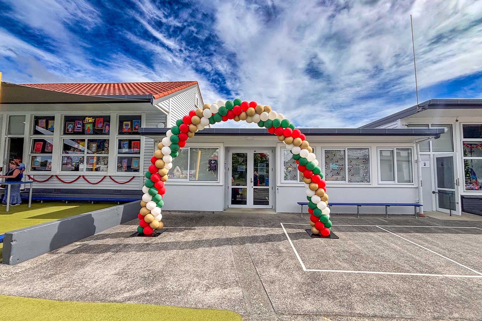 Event entrance featuring a professionally styled balloon arch