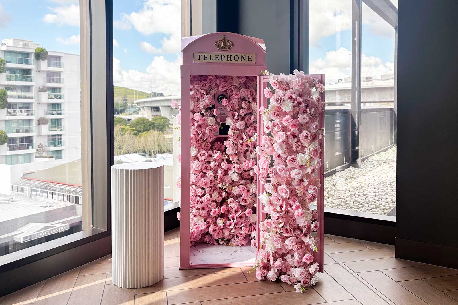 Party-ready pink phone booth for celebrations and gatherings