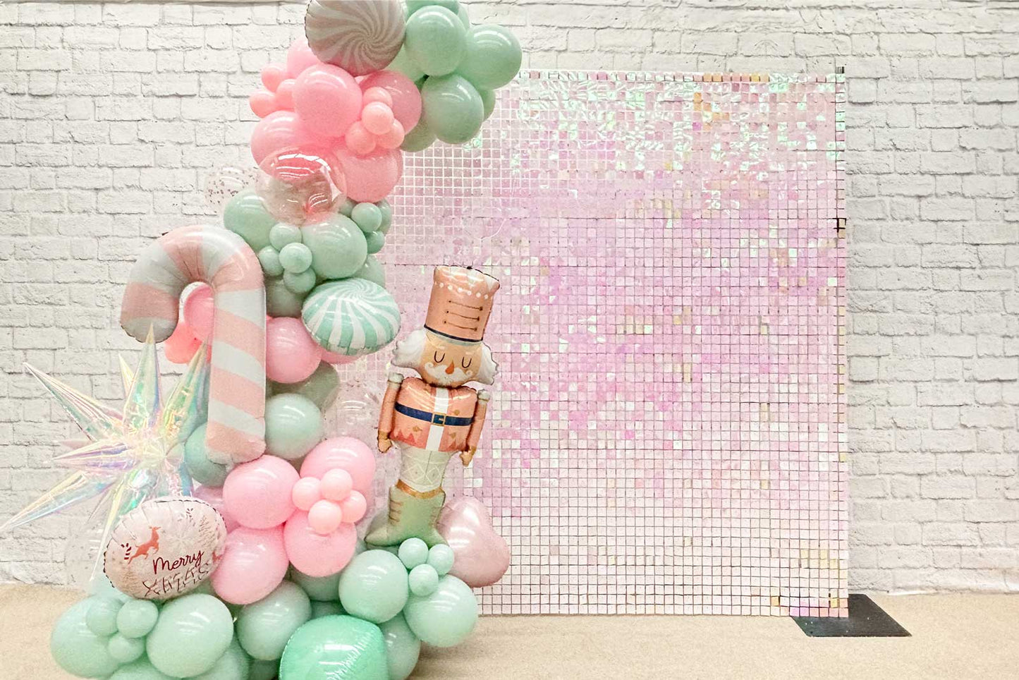 Pink iridescent shimmer wall backdrop reflecting soft rainbow tones for stylish events and photo areas