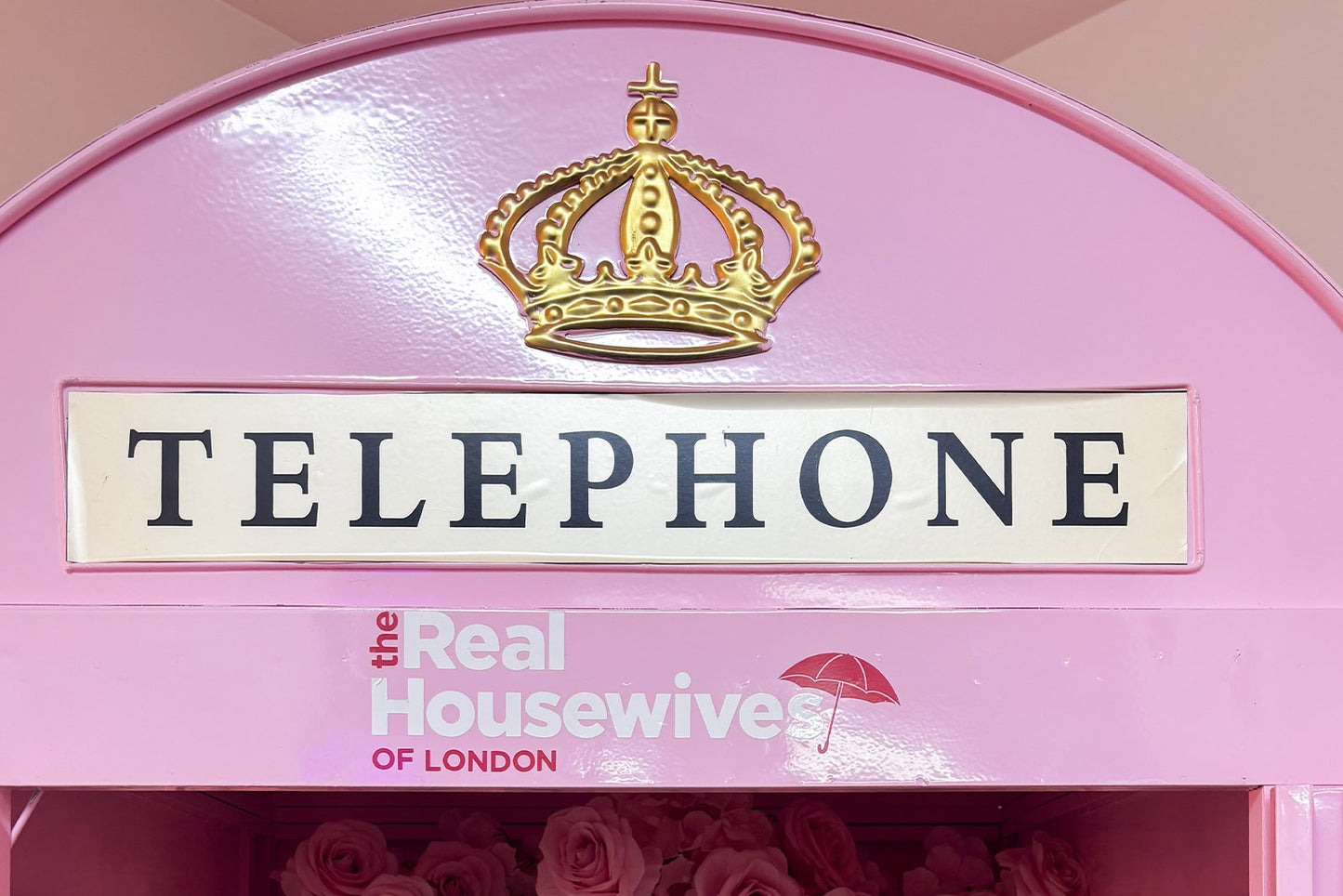 Pink phone booth for fun event photos and party décor