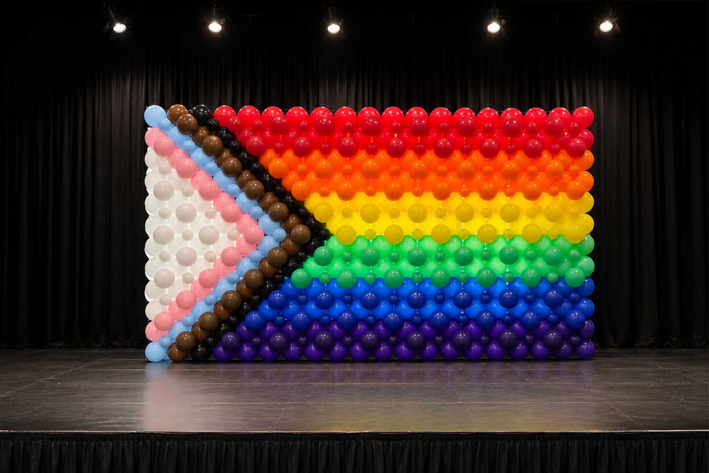 Rainbow Pride balloon flag display with vibrant coloured balloons, perfect for Pride celebrations, community events, festivals, corporate functions, and inclusive event décor across New Zealand.
