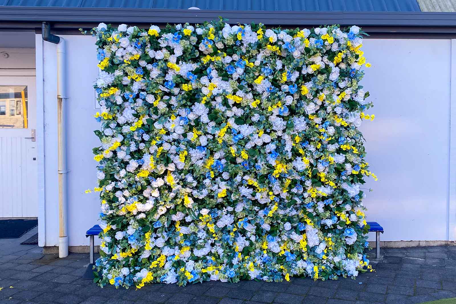 Professional flower wall backdrop for corporate events, conferences, and networking