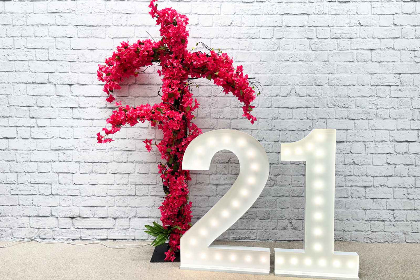 Realistic artificial flowers for hire to decorate birthday events and party tables