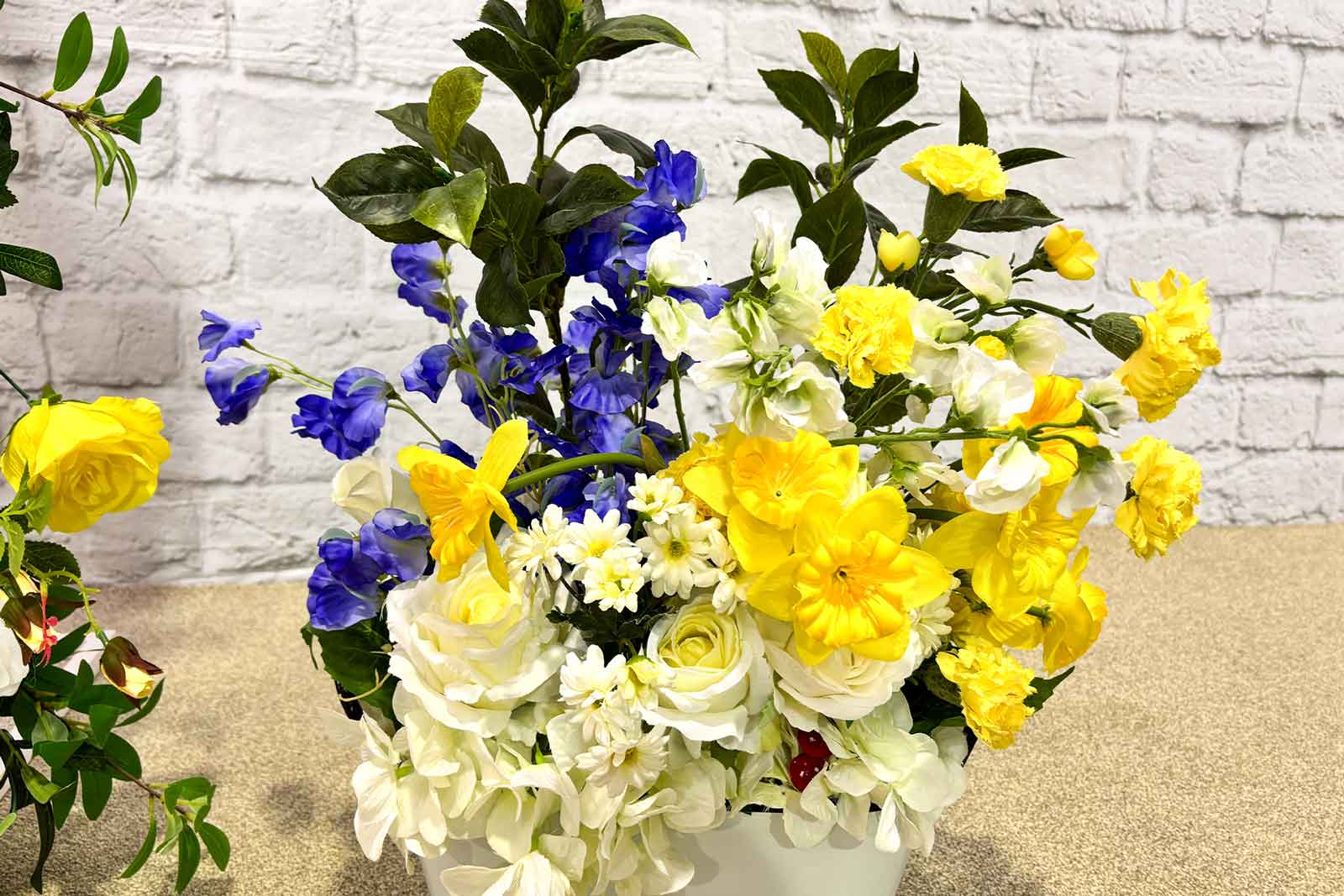 Realistic artificial flowers for hire to decorate venues and celebration spaces
