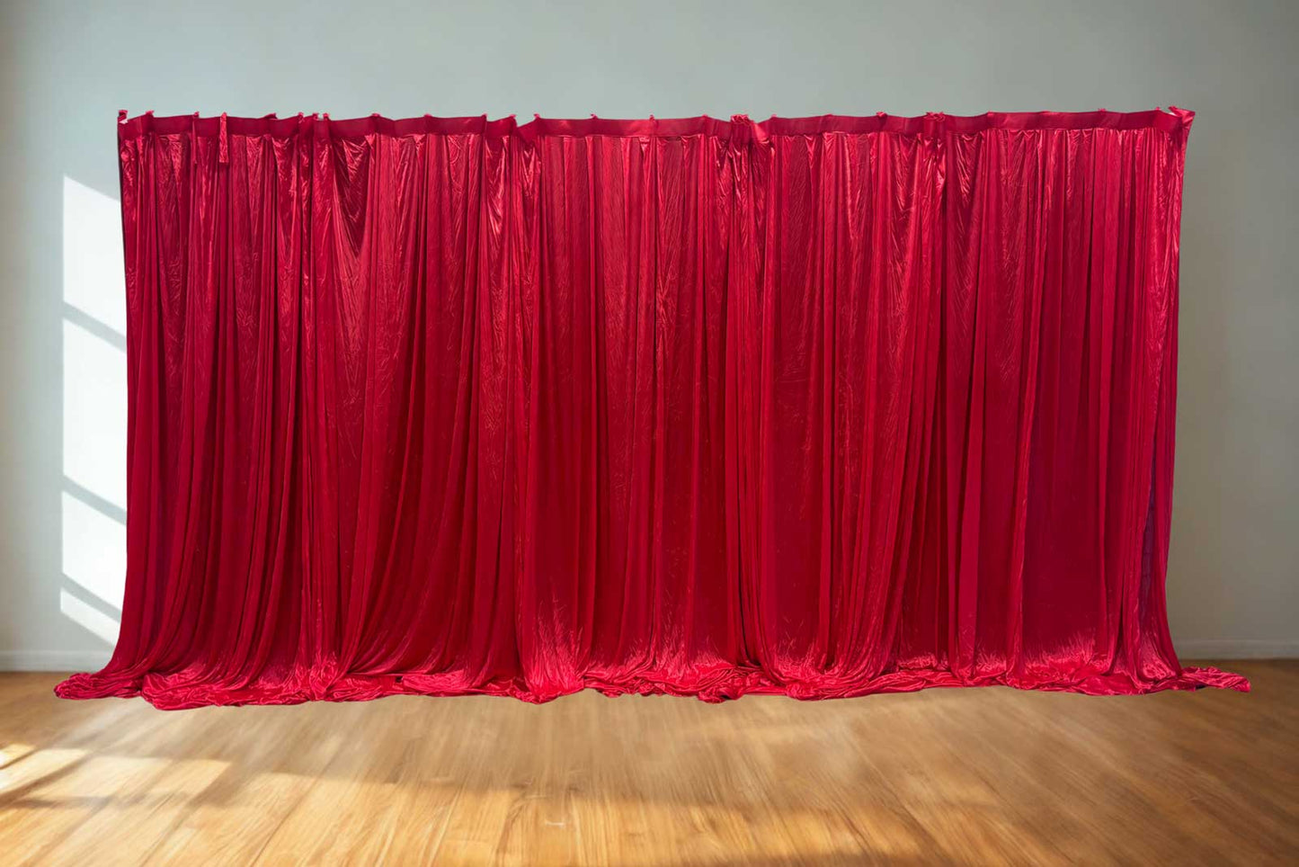 Red backdrop curtain hire for parties, weddings, and event photo areas