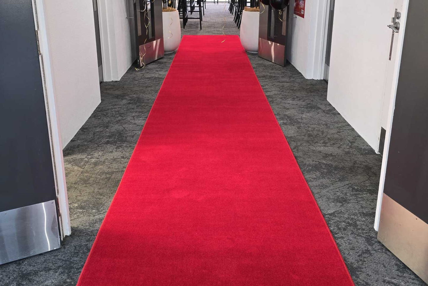 Red carpet hire to enhance VIP areas, photo walls, and special event styling
