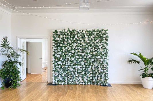Romantic 21st flower wall backdrop with vibrant blooms for your next birthday