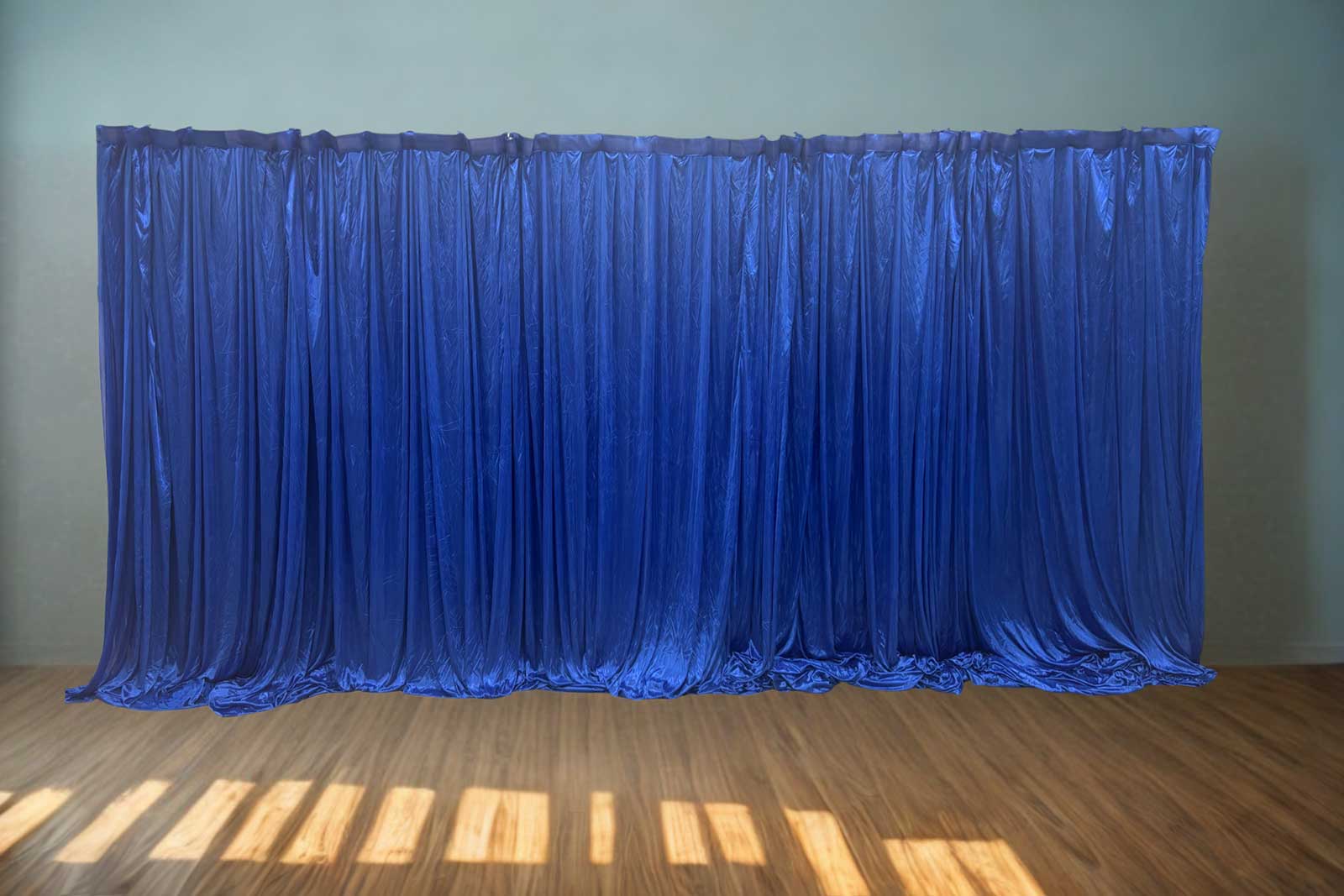 Royal blue backdrop curtain hire for weddings, parties, and corporate event décor