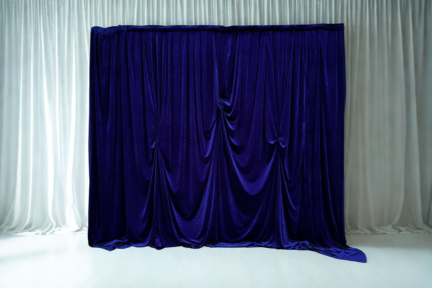 Royal blue draping hire for weddings, parties, and elegant event styling