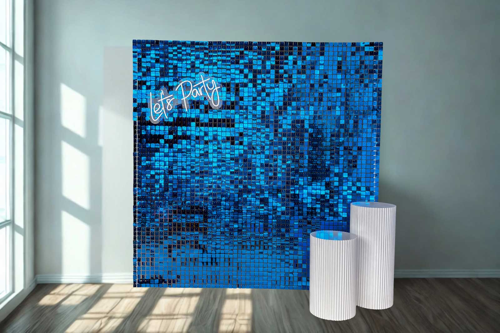 Royal blue shimmer wall backdrop creating a bold and elegant photo feature for celebrations