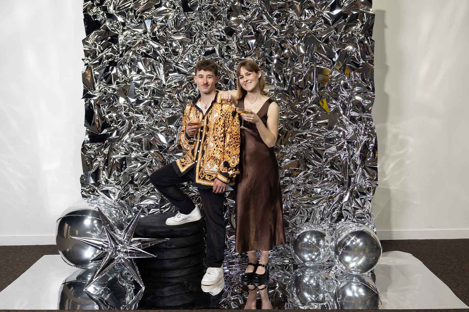 Contemporary silver crinkle foil wall backdrop for corporate gala and awards night