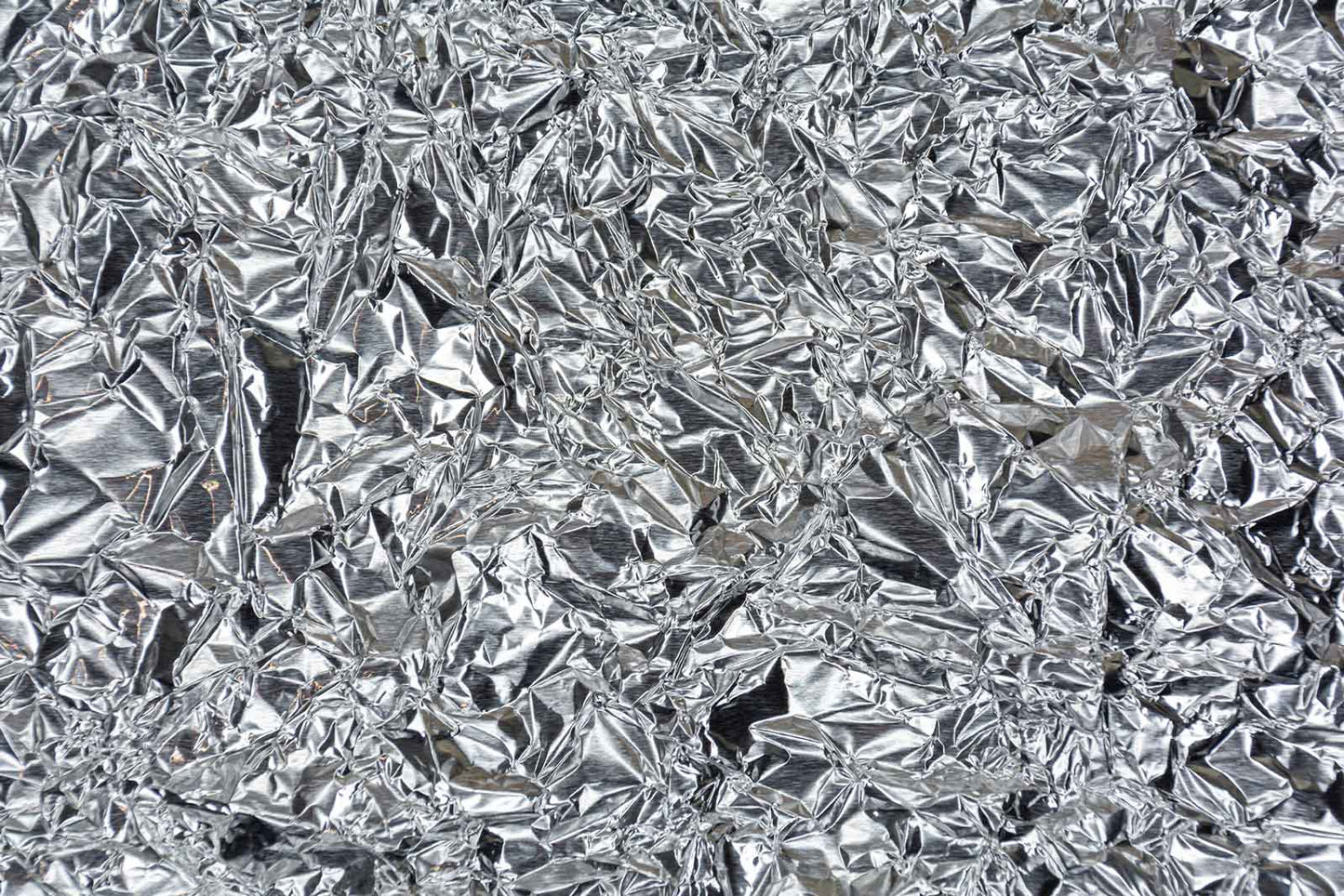 Metallic silver crinkle foil wall for corporate launches and professional events