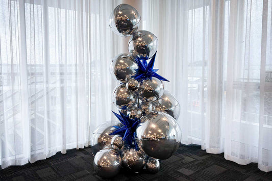 Silver foil ball tower for corporate event styling