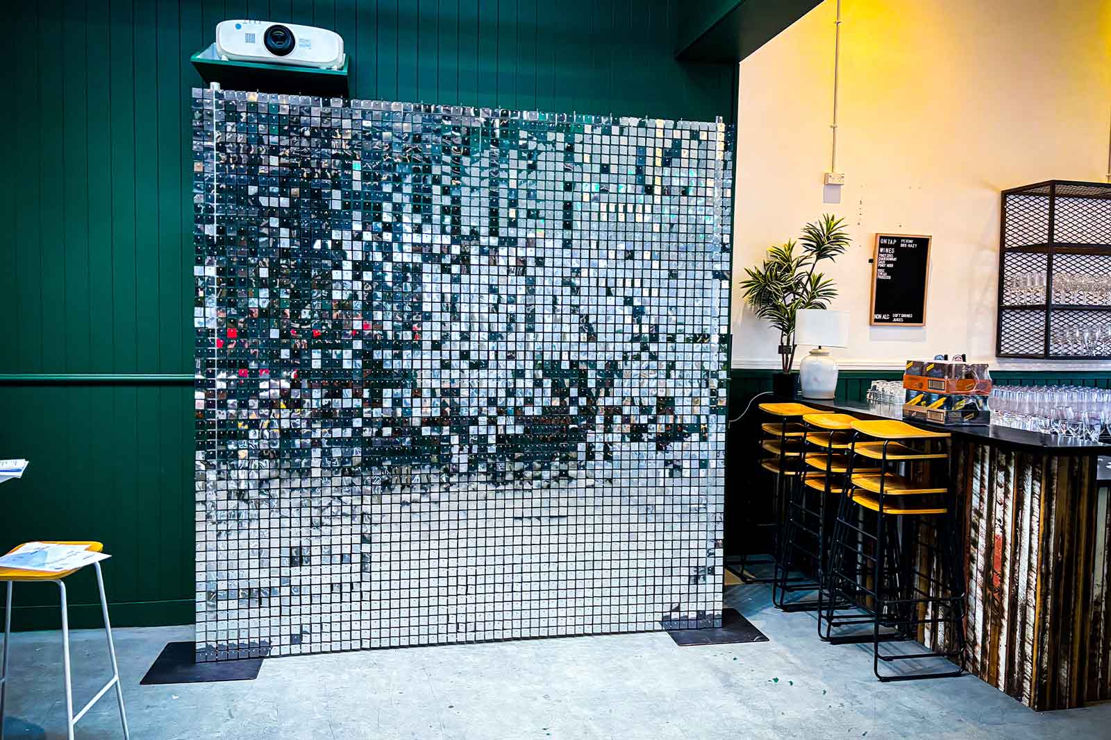 Silver shimmer wall backdrop for corporate meetings and event styling