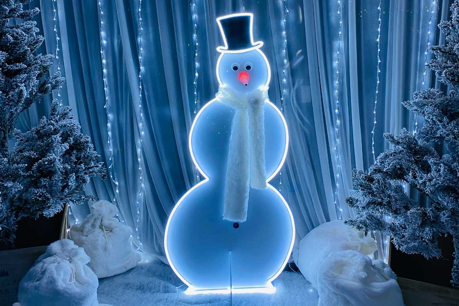 Snowman neon sign hire for Christmas parties, festive events and holiday celebrations in Auckland by Mad Dog Backdrops.