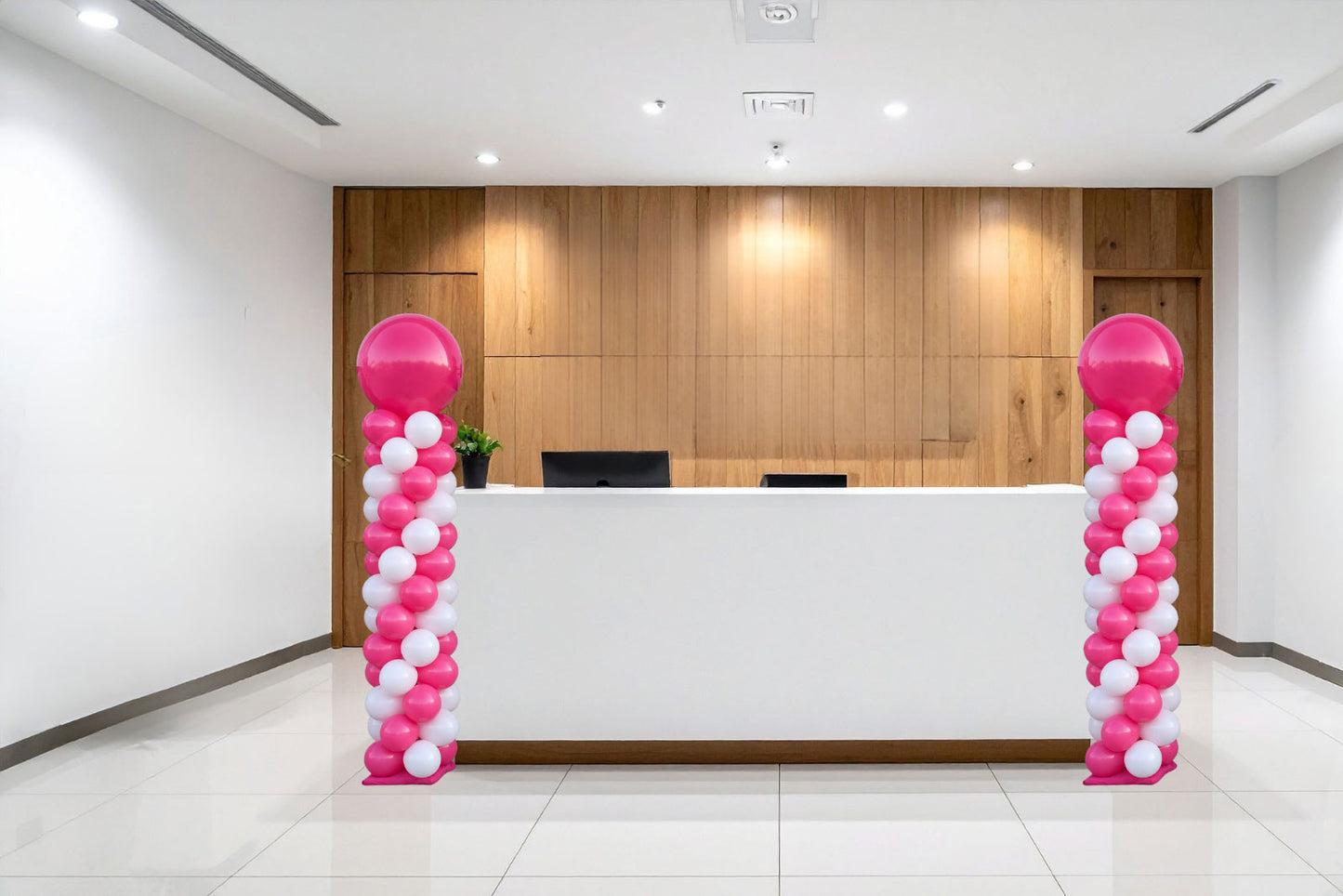 spiral balloon column display featuring stacked balloons in a twisting pattern for event styling and photo backdrops