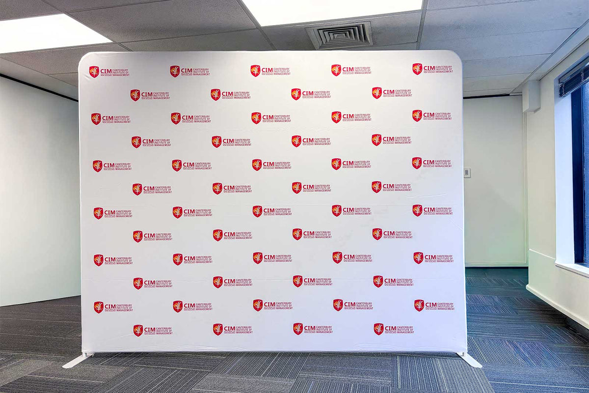 Step and repeat media wall with custom branded event backdrop
