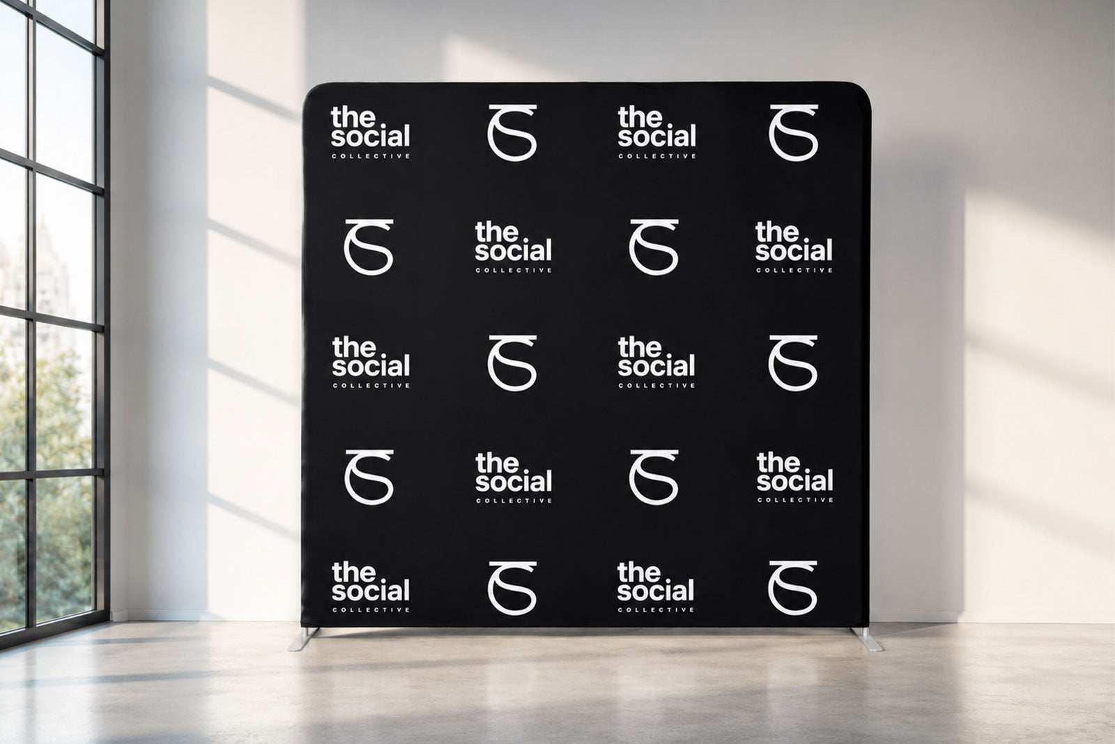 Stretch tension media wall with step and repeat