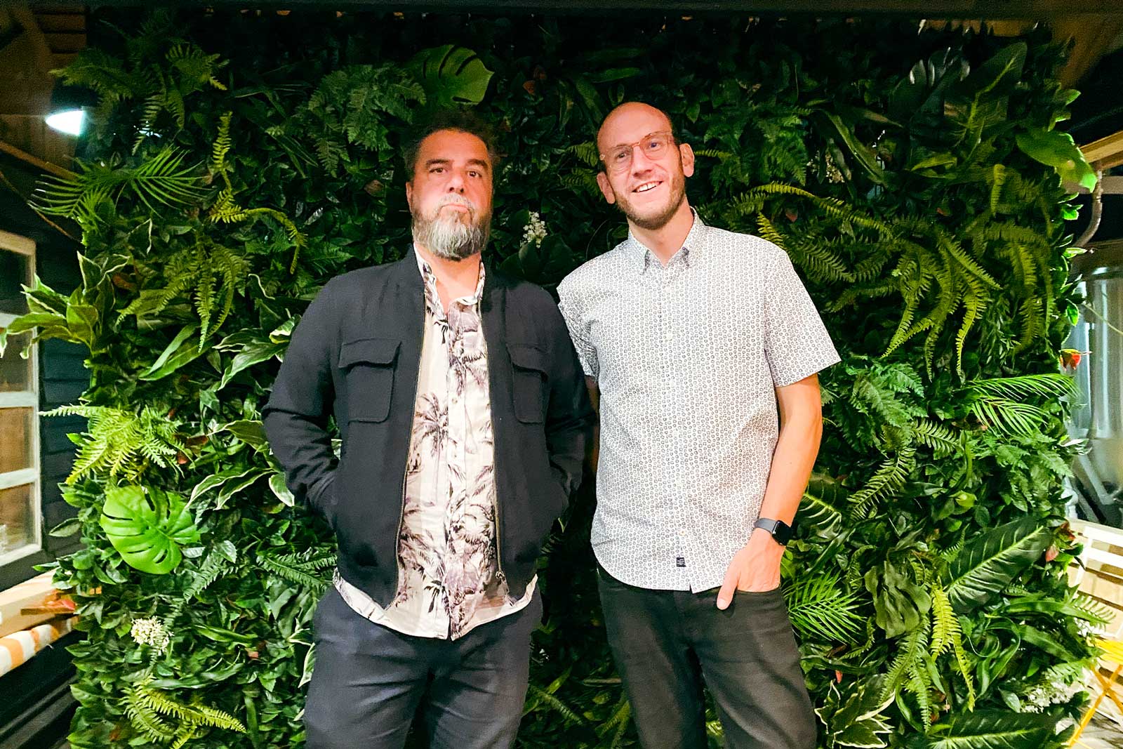 Tropical foliage feature wall creating a lush natural backdrop for event styling and celebrations