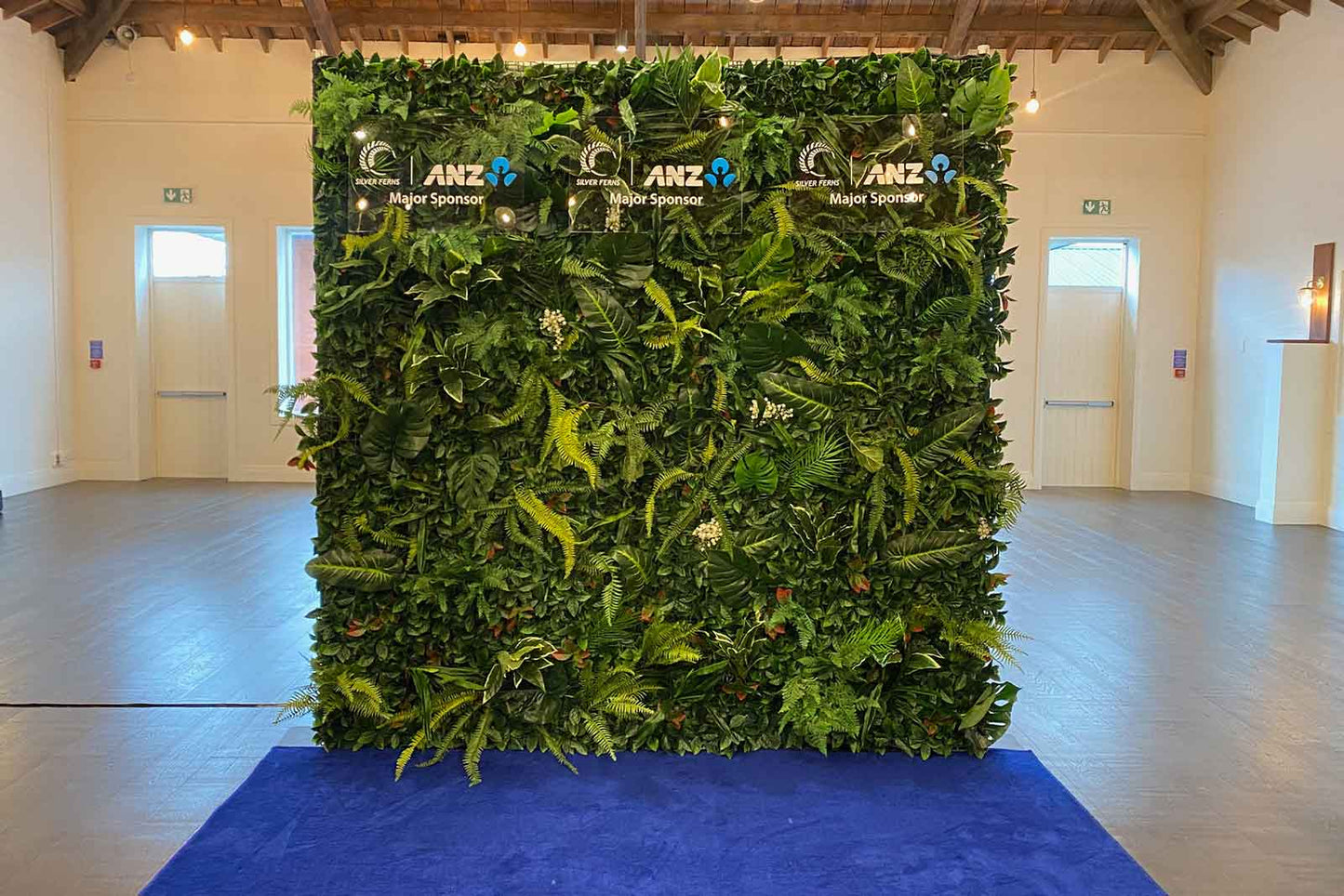 Tropical greenery backdrop hire for corporate events and conferences