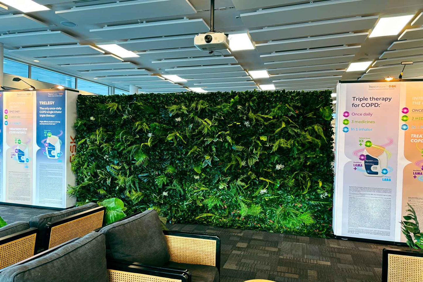 Tropical leaf wall event backdrop featuring lush greenery for weddings, parties and corporate events in New Zealand