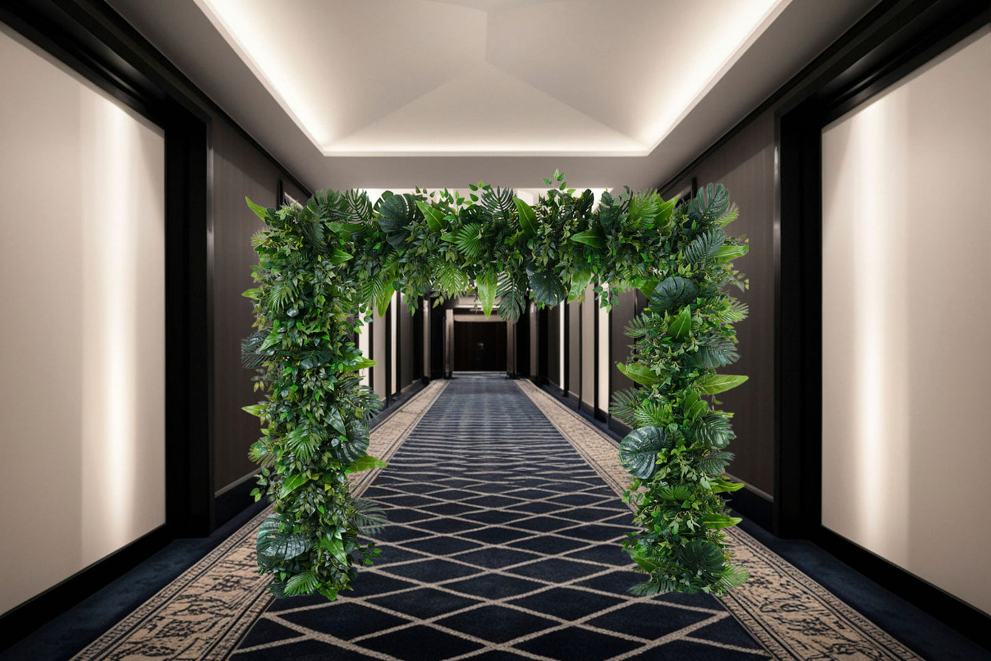 Tropical Oasis Greenery Frame with lush tropical foliage and monstera leaves, designed as a walk-through entrance feature and photo backdrop for weddings, corporate events, and tropical-themed celebrations in Auckland.