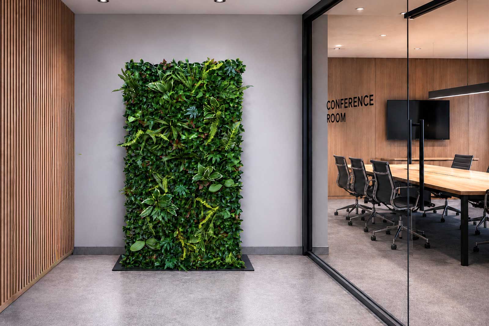 Tropical wall backdrop with lush greenery for tropical-themed parties, weddings and corporate events.