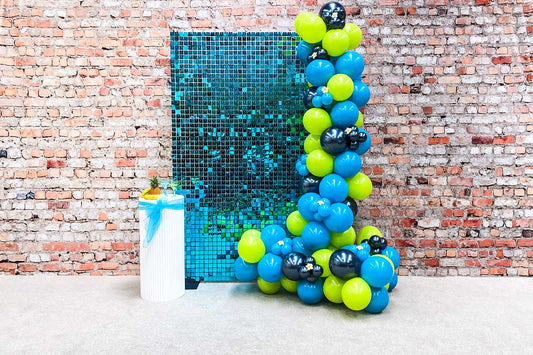 Turquoise shimmer wall backdrop creating a vibrant and modern photo area for events