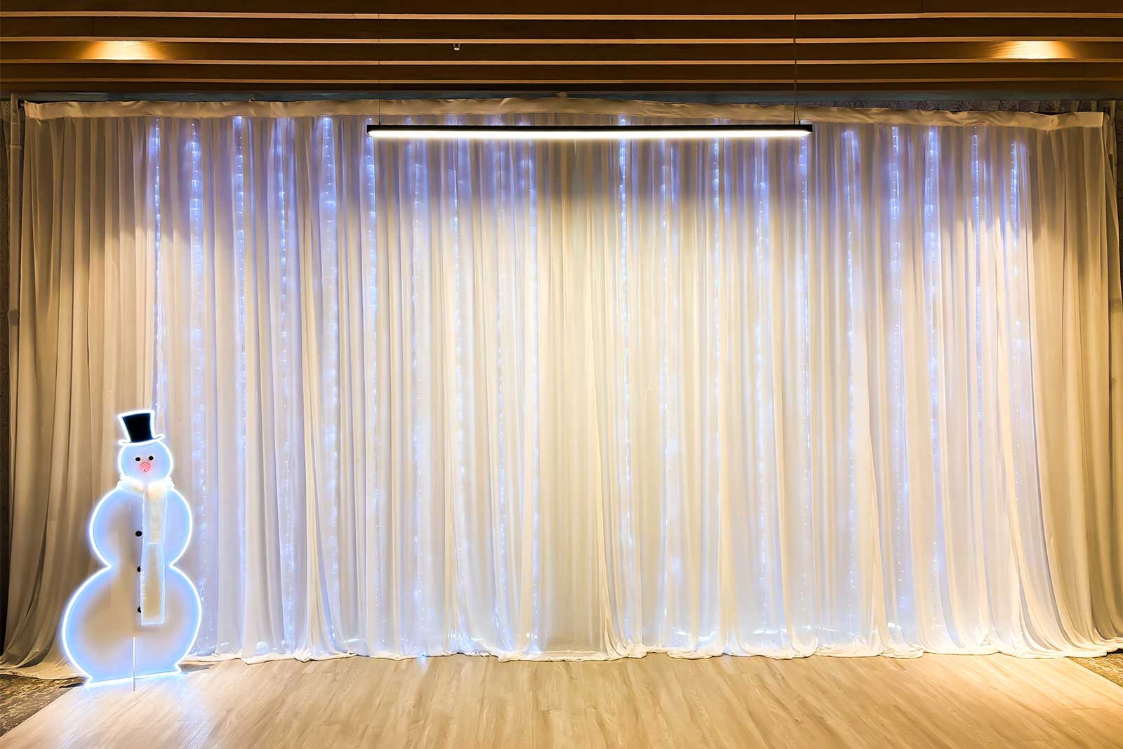 White curtain backdrop for hire to create clean and stylish photo areas at events