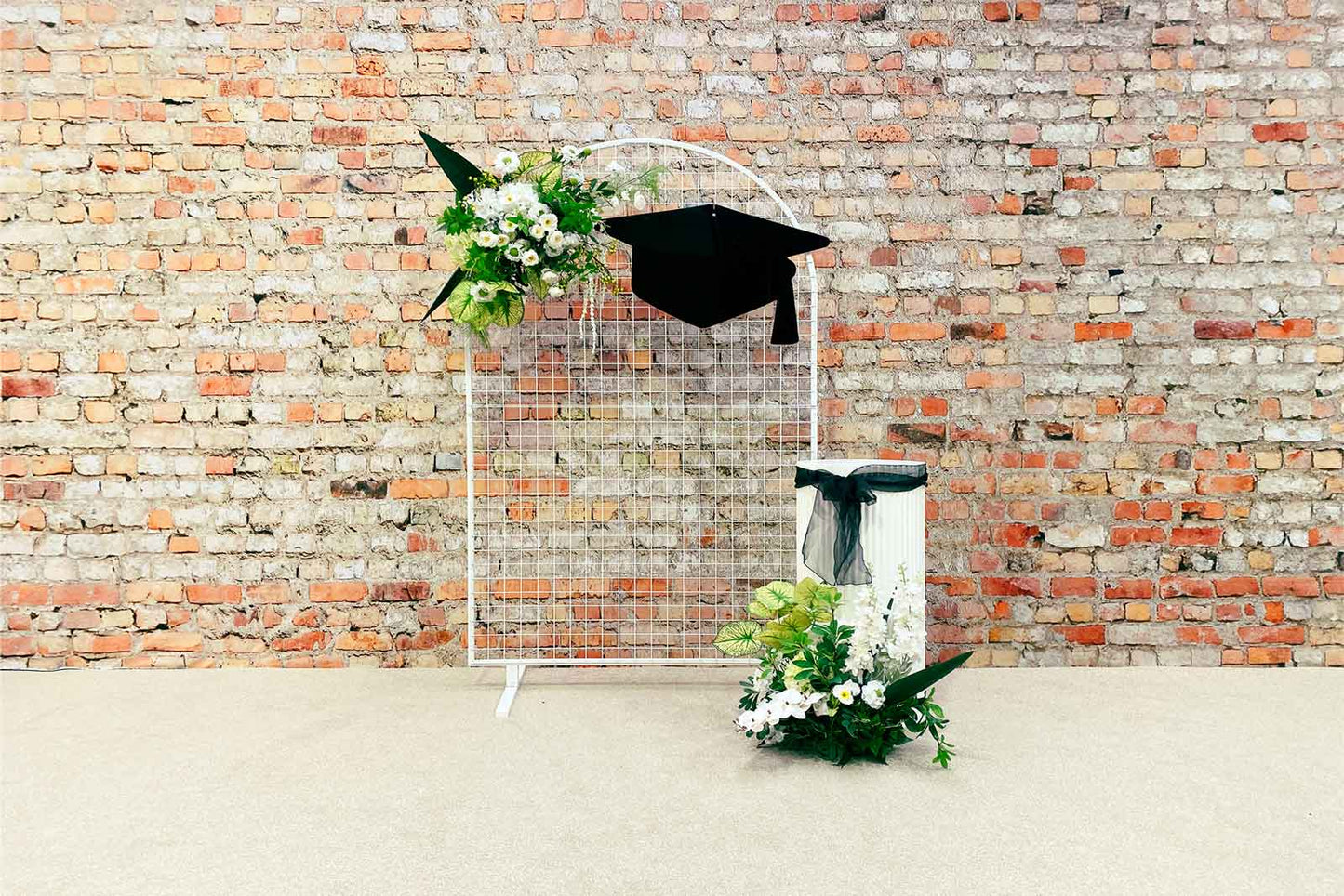White mesh arch backdrop for weddings, celebrations, and elegant event styling