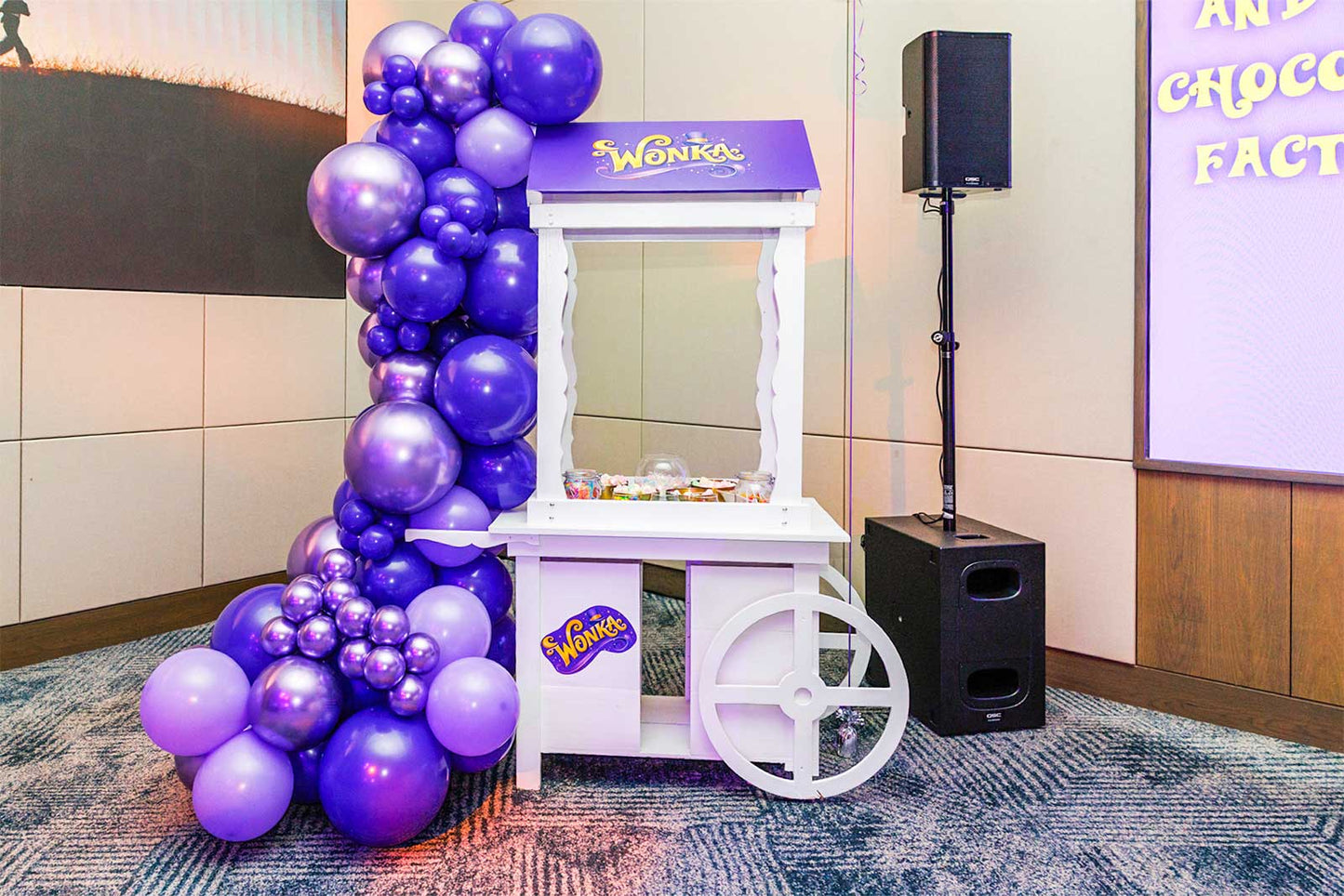 Willy Wonka candy cart hire with colourful sweets display for parties and events in Auckland