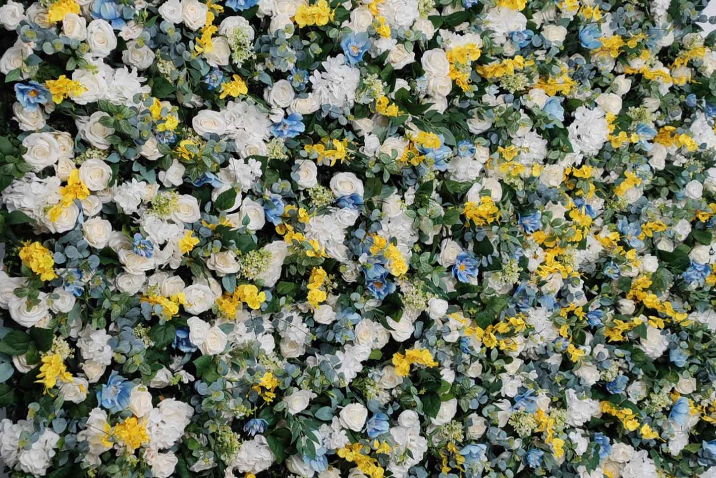 Elegant yellow and blue floral wall for corporate parties and networking events