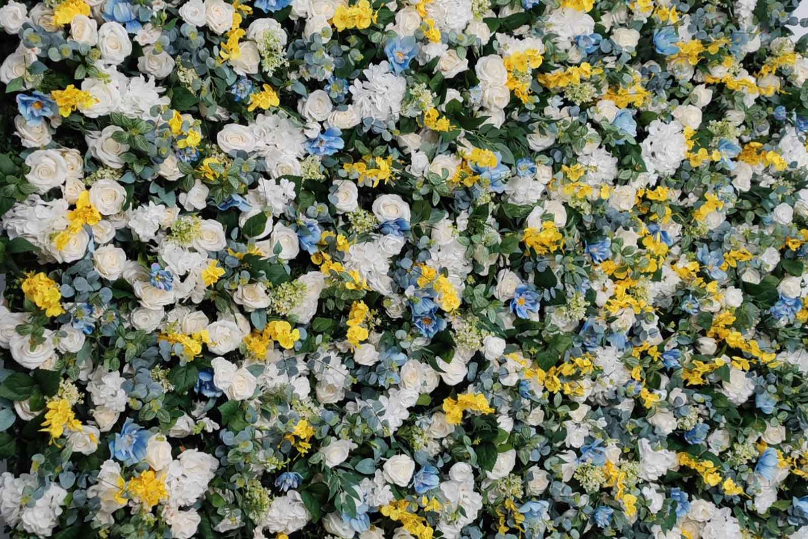 Elegant yellow and blue floral wall for corporate parties and networking events