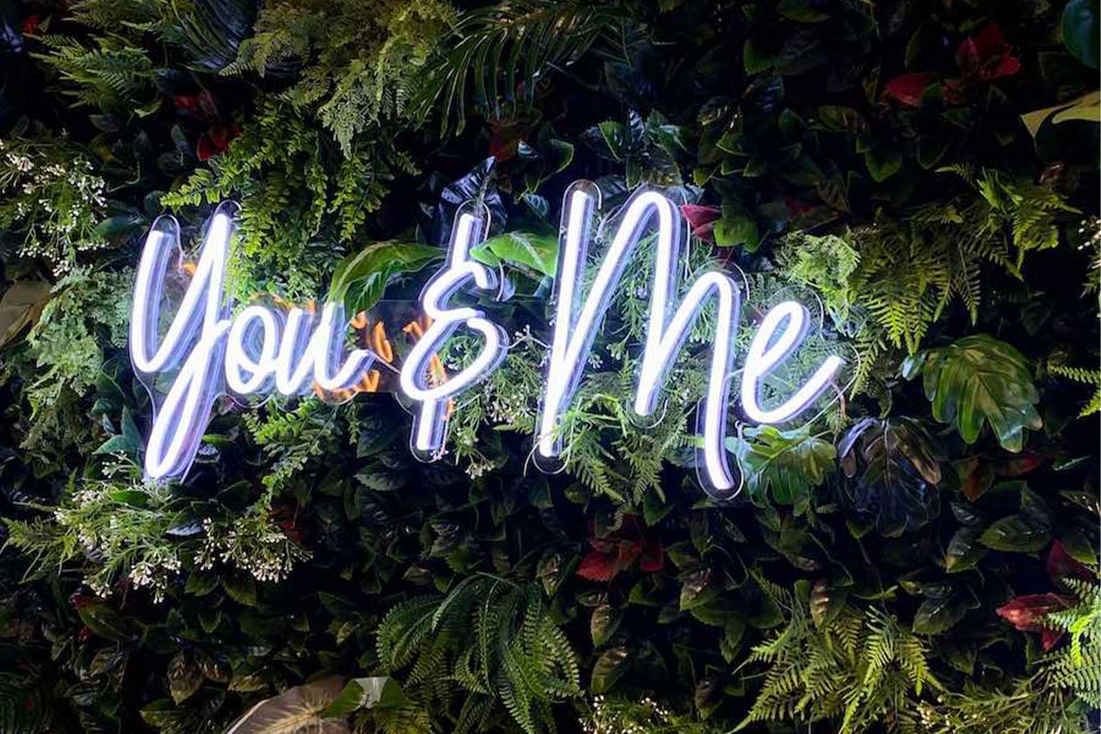 You and Me neon sign hire for weddings, engagements, bridal showers and romantic event backdrops in Auckland by Mad Dog Backdrops.