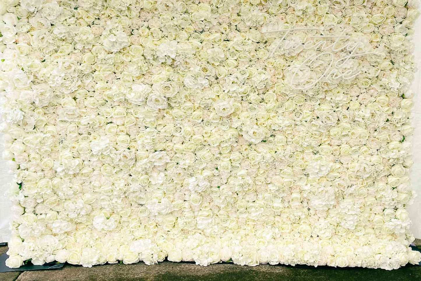 White flower wall backdrop for 21st birthday celebrations and milestone photos in NZ