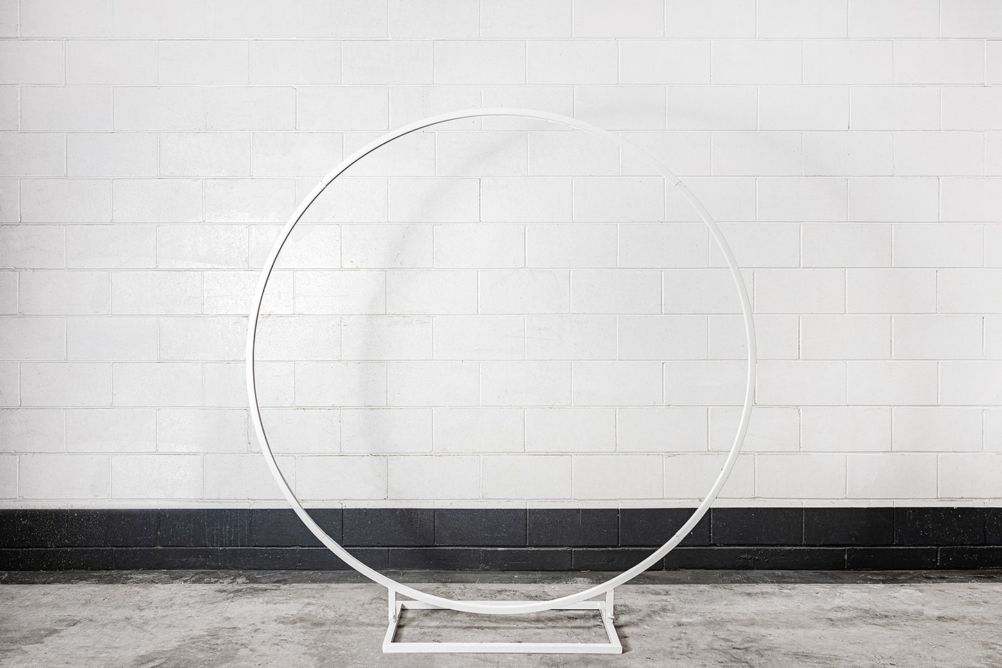 Decorative circular frame backdrop for photo displays and celebrations"