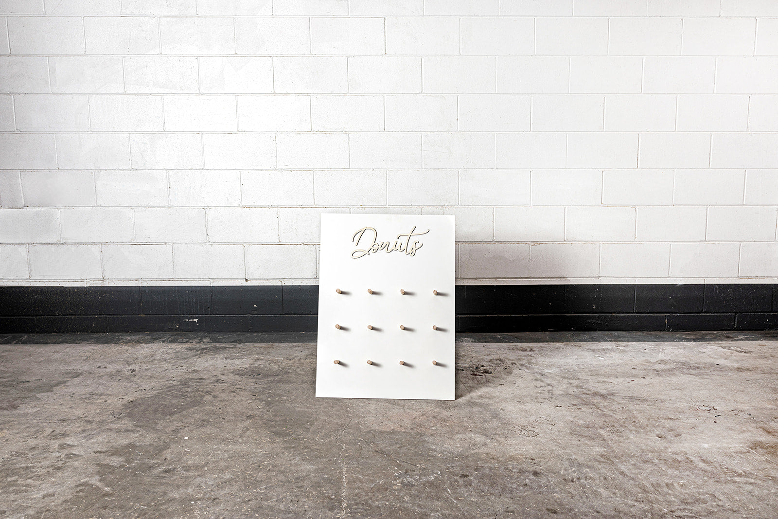 Donut wall for hire, perfect for interactive dessert stations at corporate events