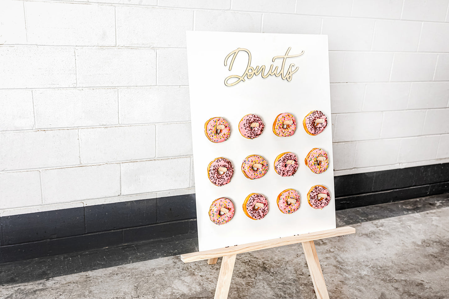 Donut wall hire for weddings, baby showers, and festive event styling