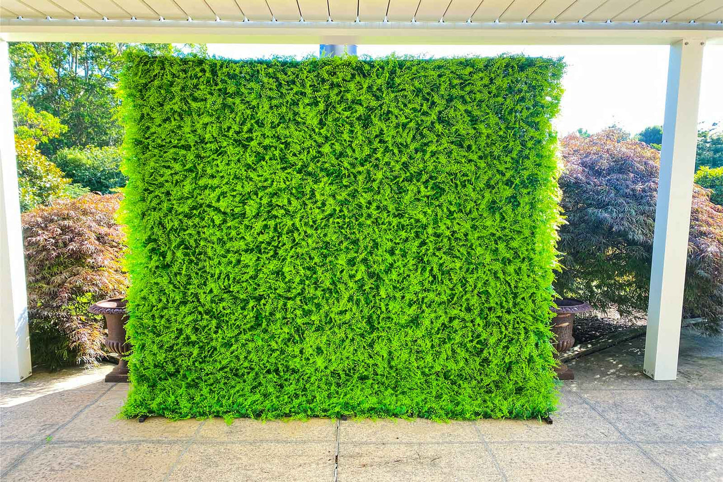 Artificial green wall backdrop for events, weddings, and photo setups in New Zealand