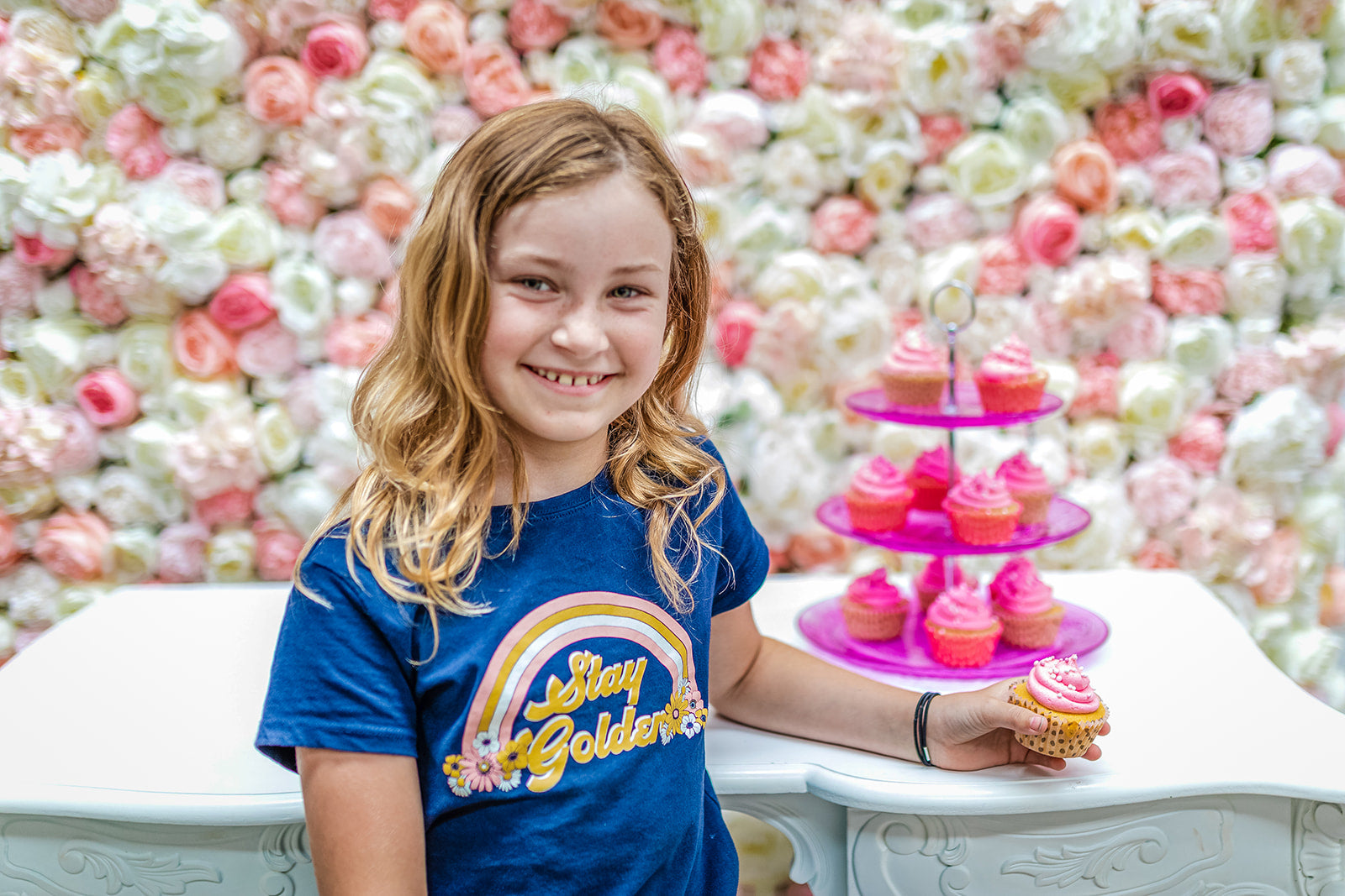Vibrant floral wall for children’s birthday party decorations and photo booth